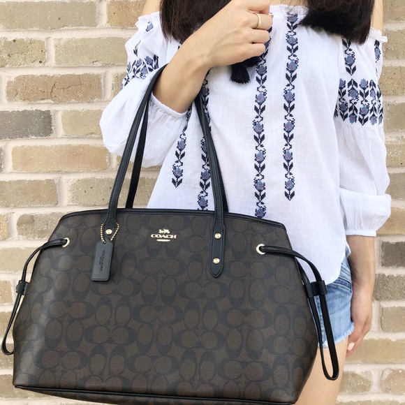 Coach Handbags - Gaby’sBags👜💕- Coach  Large purse Brown Black